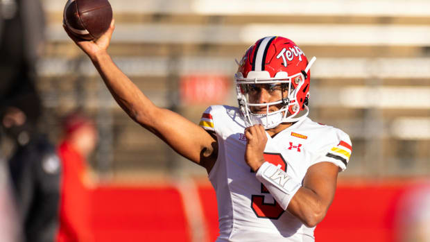 Maryland quarterback Taulia Tagovailoa (3) warms up before an NCAA college football game against Rutgers, Saturday, Nov. 25, 2023, in Piscataway, N.J. (AP Photo/Corey Sipkin)   